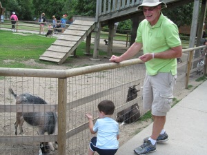 Grandpa and Jaxon feeding goats at the zoo last week.